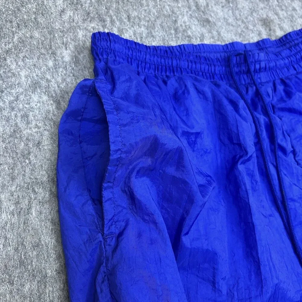Vtg Reebok Men's Track Pants Blue Nylon Elastic Waist Zip Ankle 90's Size Medium